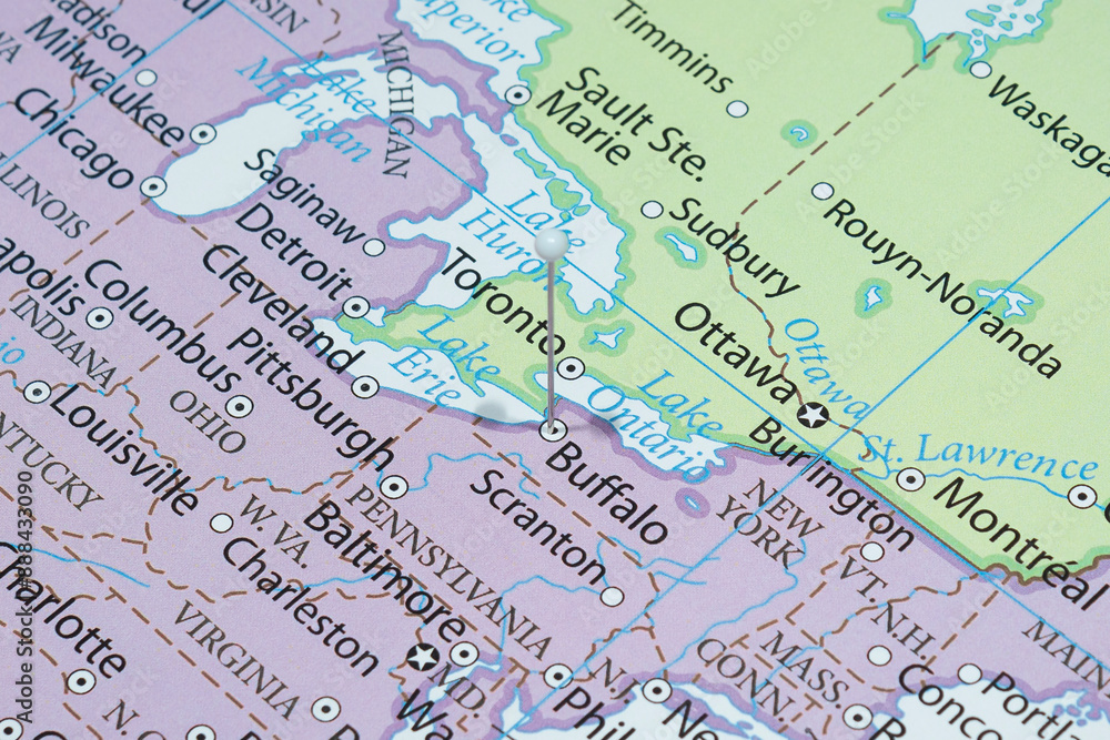 Close up to a Buffalo city with a white pin needle into United States of America country political map Close up to a Buffalo city with a white pin needle into United States of America country political map