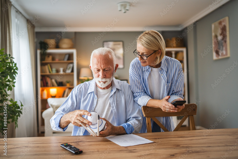 senior couple connect, adjust cctv security surveillance camera senior couple connect, adjust cctv security surveillance camera