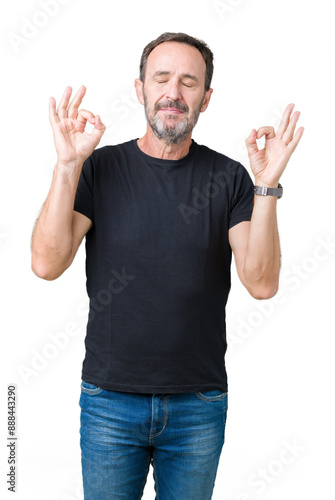 Handsome middle age hoary senior man over isolated background relax and smiling with eyes closed doing meditation gesture with fingers. Yoga concept.