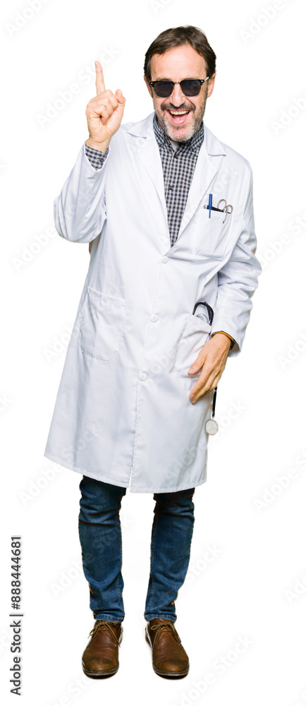 Handsome middle age doctor man wearing sunglasses pointing finger up with successful idea. Exited and happy. Number one. Handsome middle age doctor man wearing sunglasses pointing finger up with successful idea. Exited and happy. Number one.