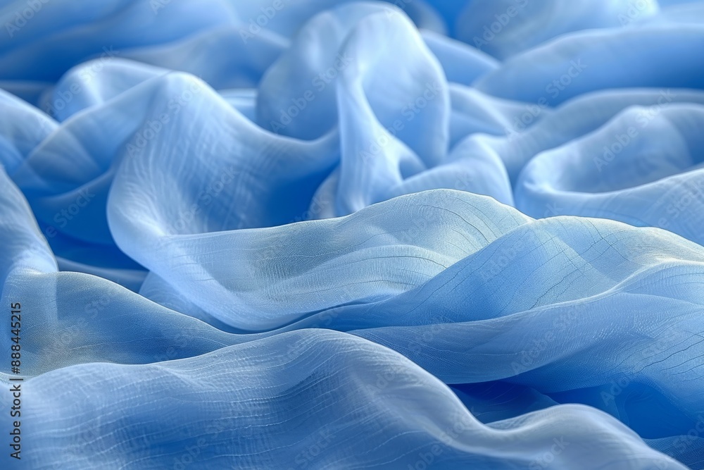 Obraz premium Blue silk fabric with intricate texture capturing elegance and luxurious design