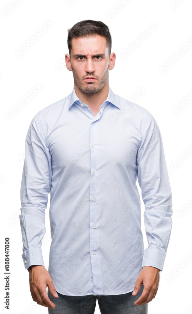 Handsome young businessman skeptic and nervous, frowning upset because of problem. Negative person. Handsome young businessman skeptic and nervous, frowning upset because of problem. Negative person.