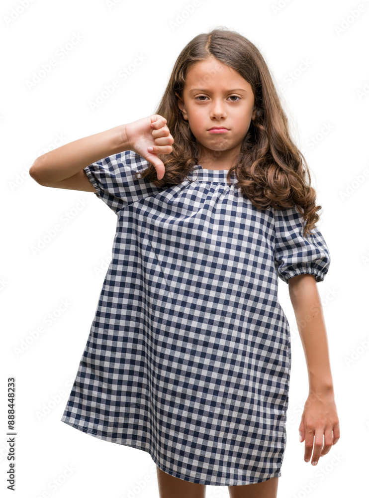 Brunette hispanic girl wearing black and white dress with angry face, negative sign showing dislike with thumbs down, rejection concept Brunette hispanic girl wearing black and white dress with angry face, negative sign showing dislike with thumbs down, rejection concept