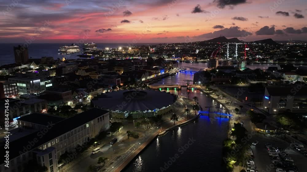 Sunset Curacao Skyline At Otrobanda Willemstad Curacao. Aerial View Of A High-Rise Buildings And Traffic Showcasing Urban Life. Building Town Sky Clouds Illumination Downtown Famous. Sunset Curacao Skyline At Otrobanda Willemstad Curacao. Aerial View Of A High-Rise Buildings And Traffic Showcasing Urban Life. Building Town Sky Clouds Illumination Downtown Famous.