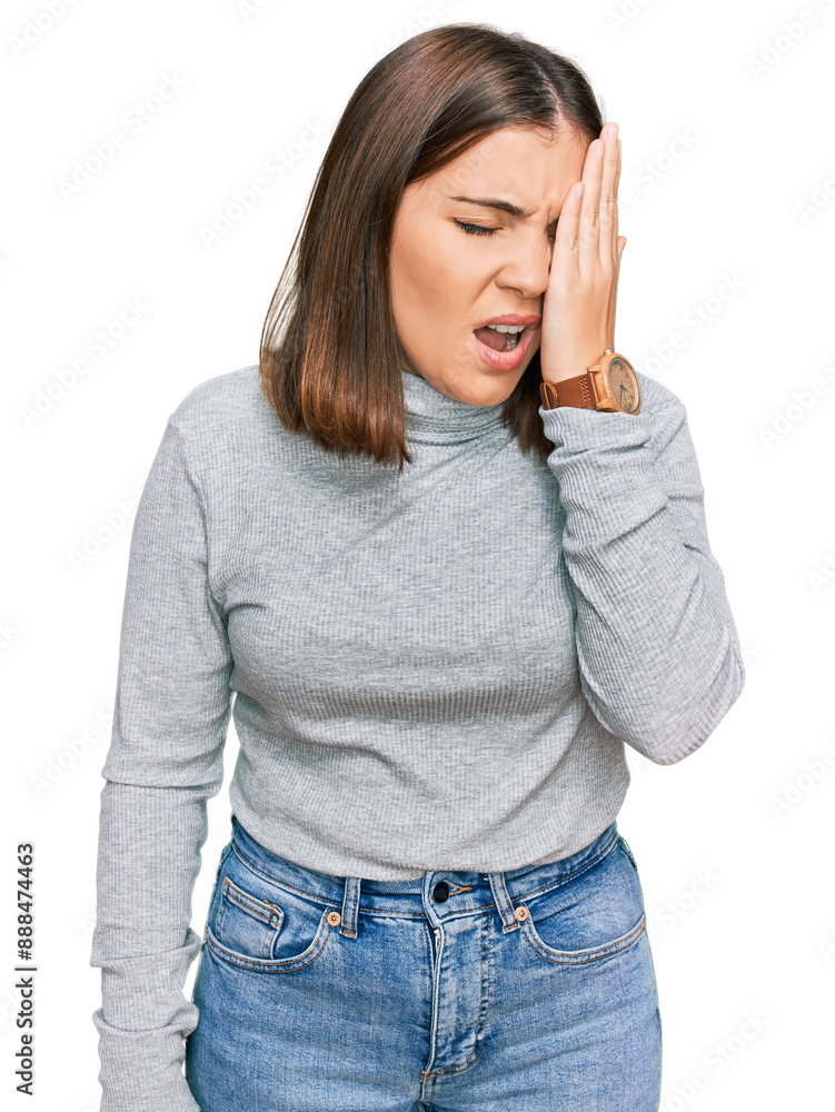 Young beautiful woman wearing casual turtleneck sweater yawning tired covering half face, eye and mouth with hand. face hurts in pain. Young beautiful woman wearing casual turtleneck sweater yawning tired covering half face, eye and mouth with hand. face hurts in pain.