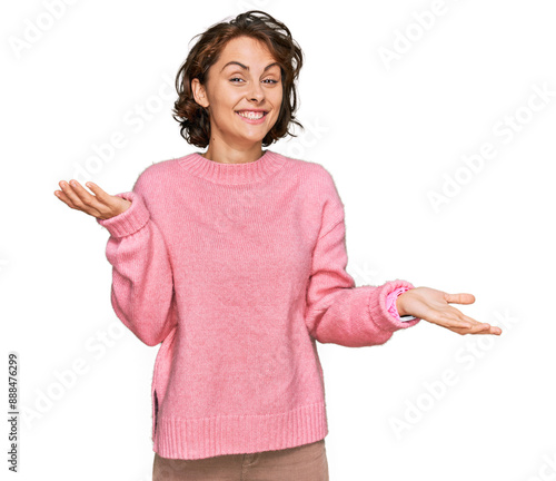 Young hispanic woman wearing casual clothes smiling showing both hands open palms, presenting and advertising comparison and balance