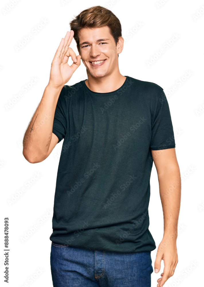 Handsome caucasian man wearing casual clothes smiling positive doing ok sign with hand and fingers. successful expression. Handsome caucasian man wearing casual clothes smiling positive doing ok sign with hand and fingers. successful expression.