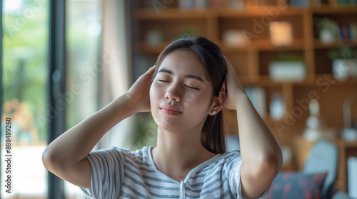 woman stretching her neck, stress concept