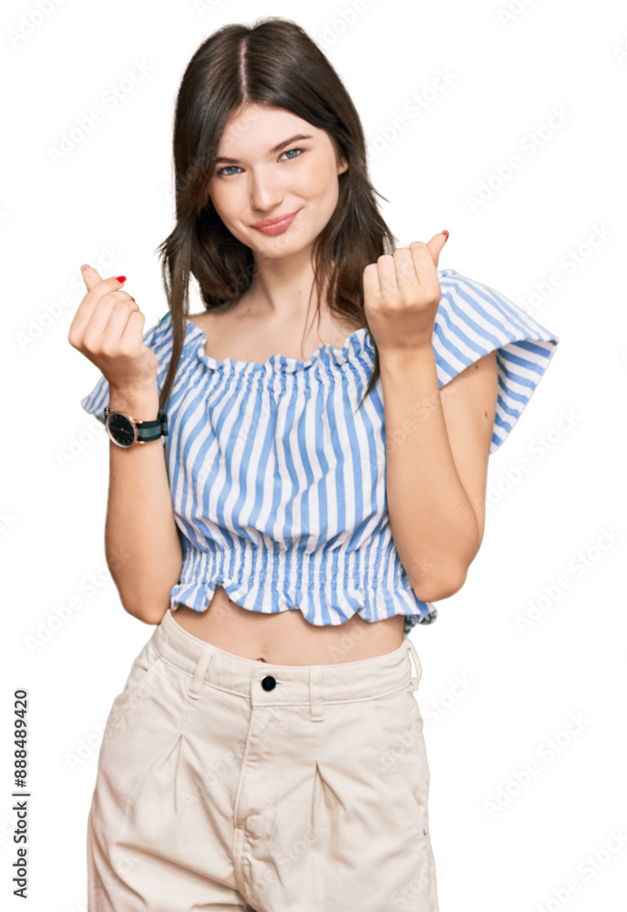 Young beautiful caucasian girl wearing casual clothes doing money gesture with hands, asking for salary payment, millionaire business Young beautiful caucasian girl wearing casual clothes doing money gesture with hands, asking for salary payment, millionaire business