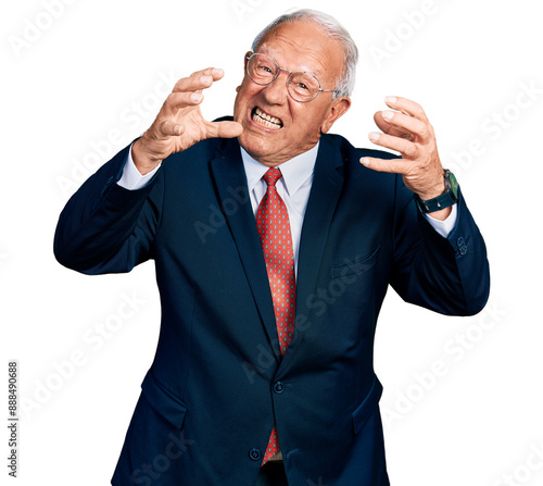 Принти на полотні Senior man with grey hair wearing business suit and glasses shouting frustrated