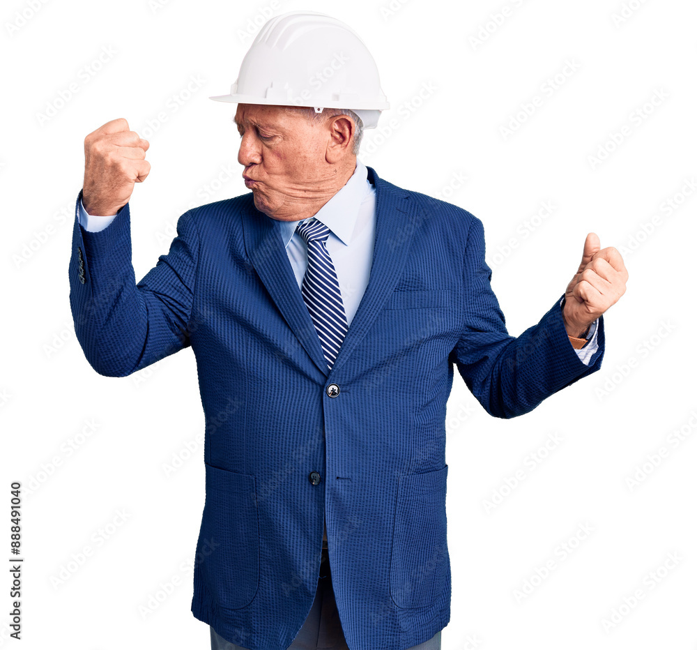 Senior handsome grey-haired man wearing suit and architect hardhat showing arms muscles smiling proud. fitness concept. Senior handsome grey-haired man wearing suit and architect hardhat showing arms muscles smiling proud. fitness concept.