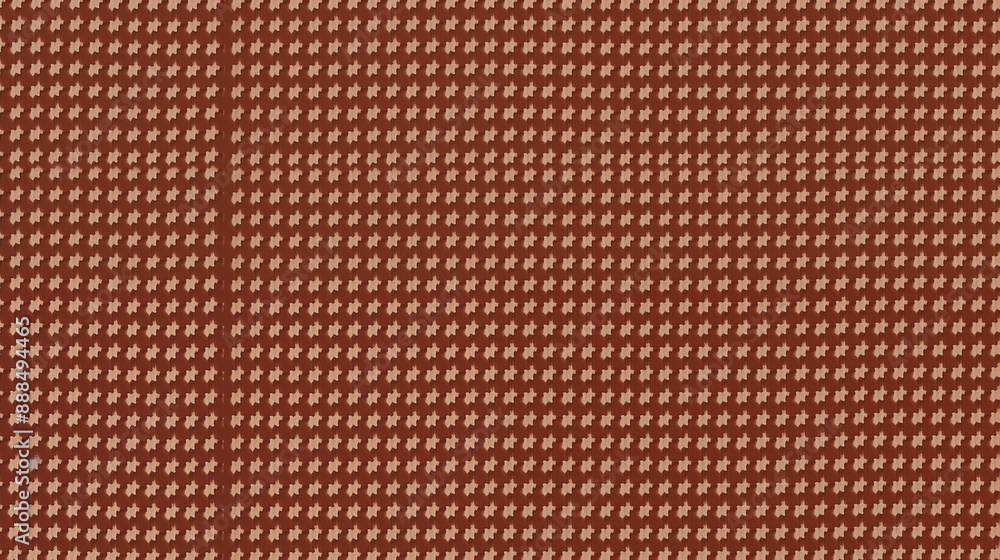 Fototapeta premium Close-up of Orange Houndstooth Fabric with Detailed Star Pattern