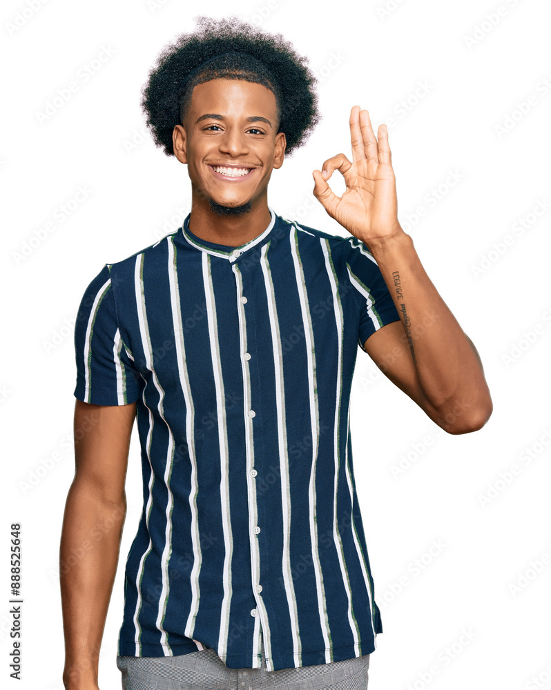 African american man with afro hair wearing casual clothes smiling positive doing ok sign with hand and fingers. successful expression. African american man with afro hair wearing casual clothes smiling positive doing ok sign with hand and fingers. successful expression.