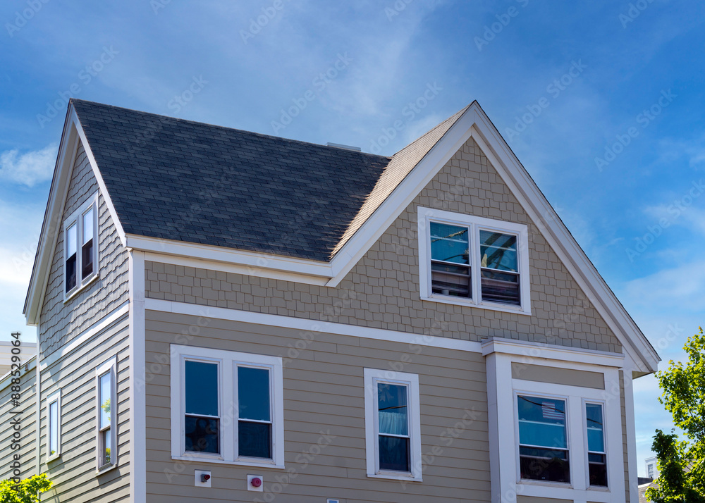 Newly built Two-Story Family House with Attic and Gable Roof in Brighton, Massachusetts, USA Newly built Two-Story Family House with Attic and Gable Roof in Brighton, Massachusetts, USA