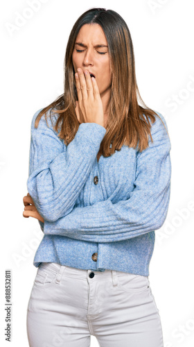 Young woman wearing casual clothes bored yawning tired covering mouth with hand. restless and sleepiness.