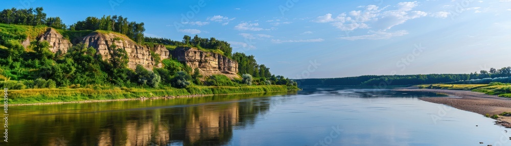 Scenic view of a tranquil river reflecting green cliffs and clear blue sky on a sunny day, perfect for nature and landscape photography. Scenic view of a tranquil river reflecting green cliffs and clear blue sky on a sunny day, perfect for nature and landscape photography.
