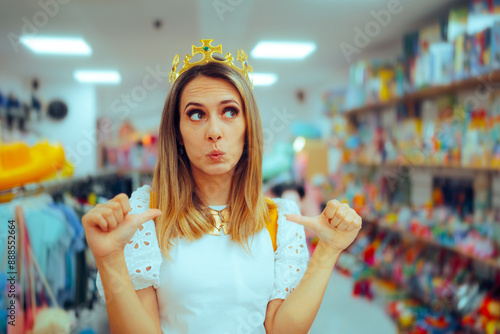 фотографія Customer is the King in a Store Wearing Golden Crown