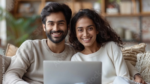 Planning a Vacation on the Couch: A young couple's journey to freedom sets off, sitting on the comfortable living room couch, free space