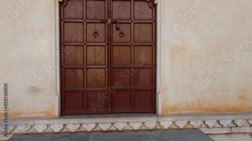 artistic wood door of ancient fort at morning video is taken at Kumbhal fort kumbhalgarh rajasthan india. photo