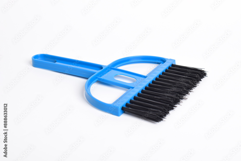 Small blue broom isolated on white background Small blue broom isolated on white background