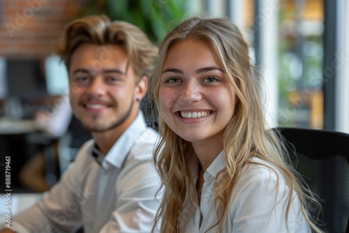 Happy Young Adults and Senior Mentors Collaborating in Technology and Coding Projects