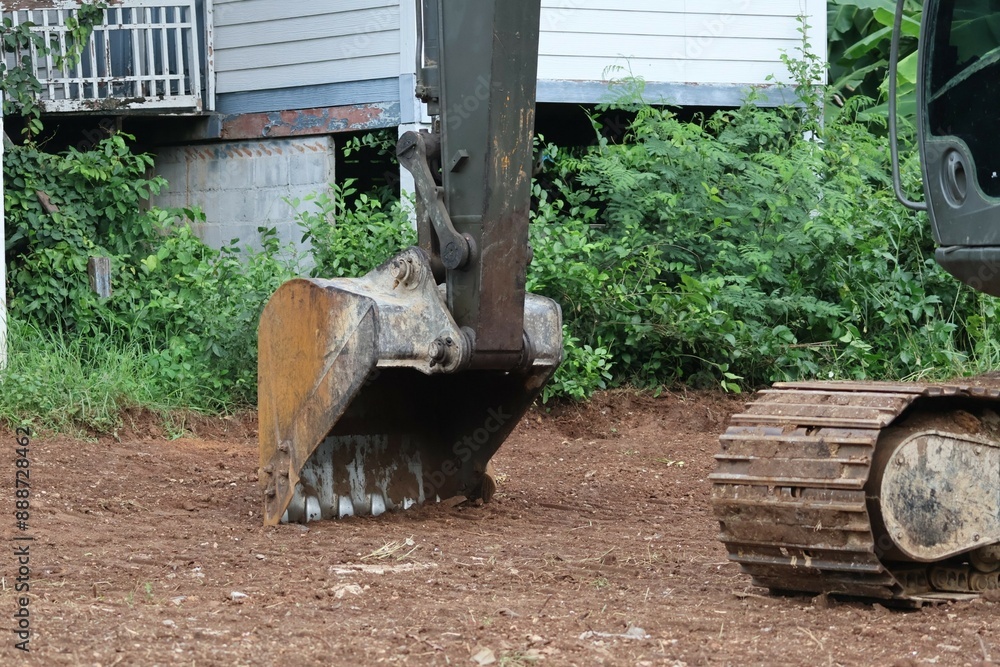 Excavator repairs broken roads, dirt roads, building roads Excavator repairs broken roads, dirt roads, building roads