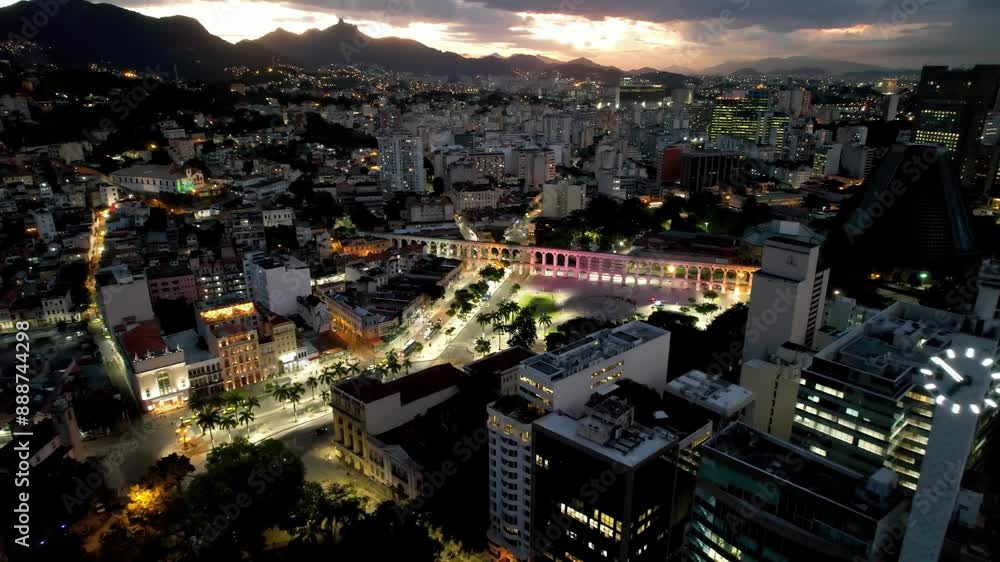 Sunset Skyline At Rio De Janeiro Brazil. Amazing Skysrapers And Traffic On Street Viewed From Above. Sunset Sky Clouds Downtown Cityscape. Sunset Downtown Illumination. Rio de Janeiro Brazil. Sunset Skyline At Rio De Janeiro Brazil. Amazing Skysrapers And Traffic On Street Viewed From Above. Sunset Sky Clouds Downtown Cityscape. Sunset Downtown Illumination. Rio de Janeiro Brazil.