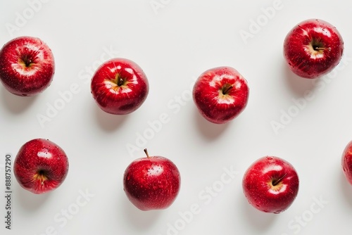 Red apples on a white surface photo