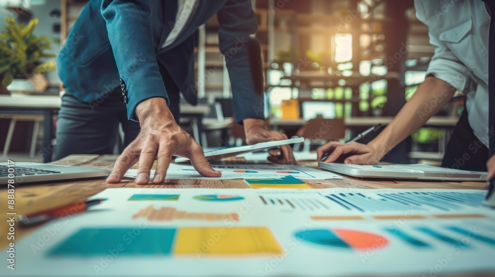 businesspeople working with partners is adjusting marketing strategies to analyze profitable businesspeople working with partners is adjusting marketing strategies to analyze profitable
