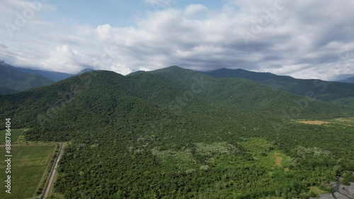 Aerial shot of the scenic green hills and fields in the North Georgia Mountains, filmed in Napareuli, Georgia photo