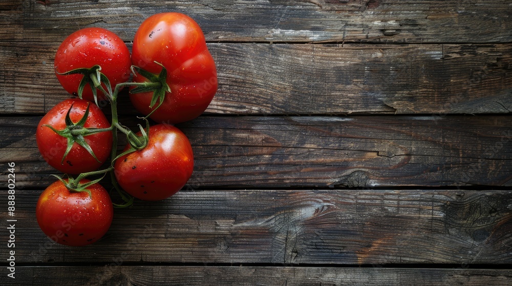 Top view of ox heart tomatoes on rustic wood background with space for text Top view of ox heart tomatoes on rustic wood background with space for text