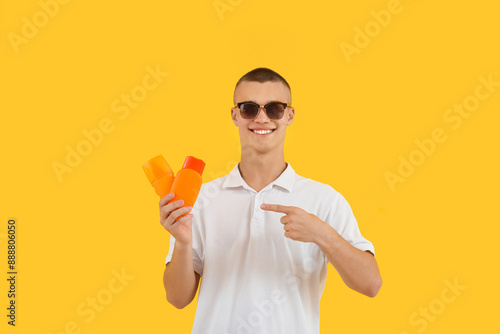 Happy young man in sunglass...