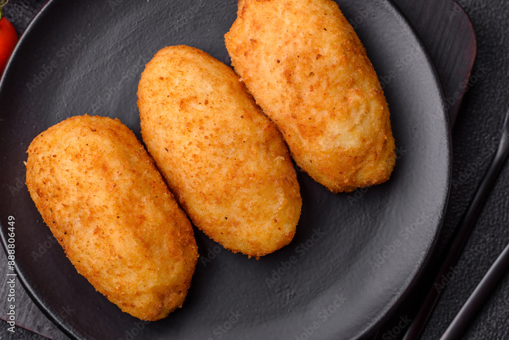 Delicious chicken Kiev or potato cutlets with salt, spices and herbs Delicious chicken Kiev or potato cutlets with salt, spices and herbs