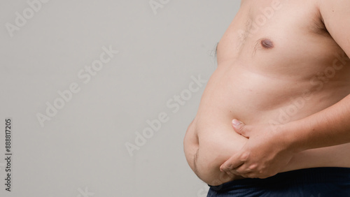 Wallpaper Mural Overweight or obese man on white background. Fat mens body measurements. he is dieting and losing weight. Healthcare, medicine concept. he is dieting and losing weight. Torontodigital.ca
