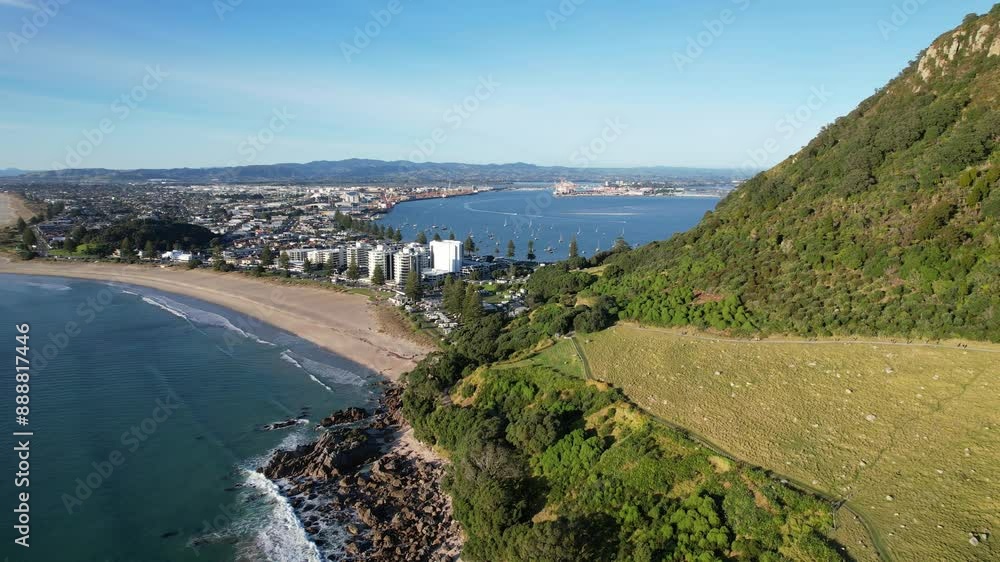 Mount Maunganui Base Hiking Trail With Cityscape In The Background In North Island, New Zealand. Aerial Drone Shot Mount Maunganui Base Hiking Trail With Cityscape In The Background In North Island, New Zealand. Aerial Drone Shot