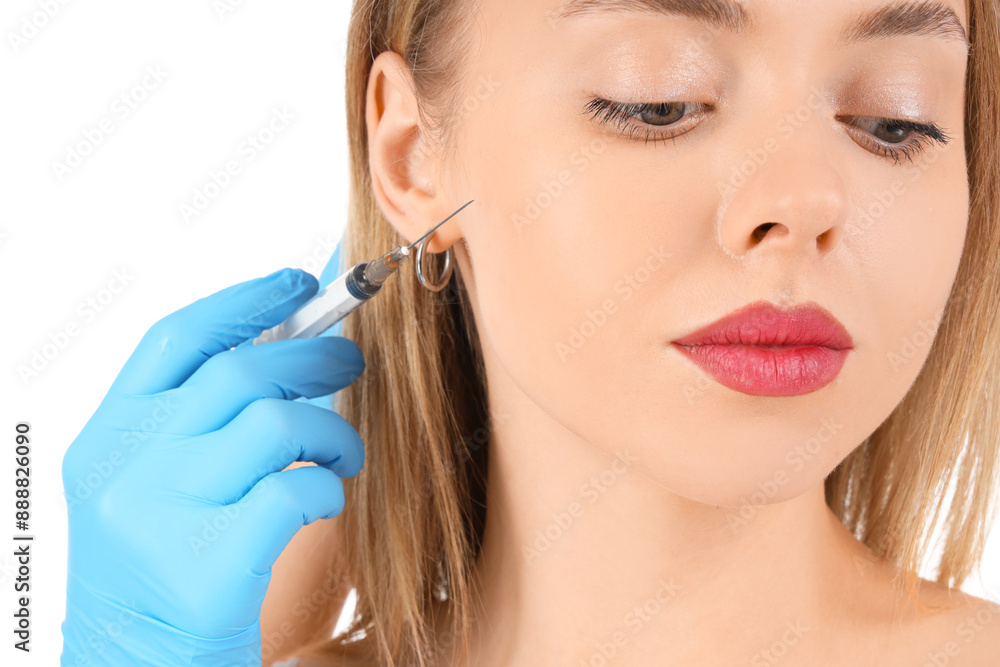 Young woman receiving filler injection in face against white background, closeup. Skin care concept Young woman receiving filler injection in face against white background, closeup. Skin care concept