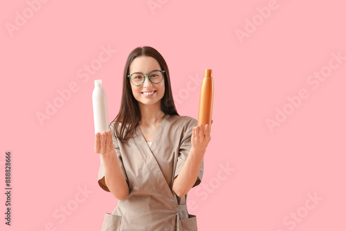 Female massage therapist in...