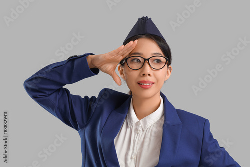 Young Asian stewardess wear...