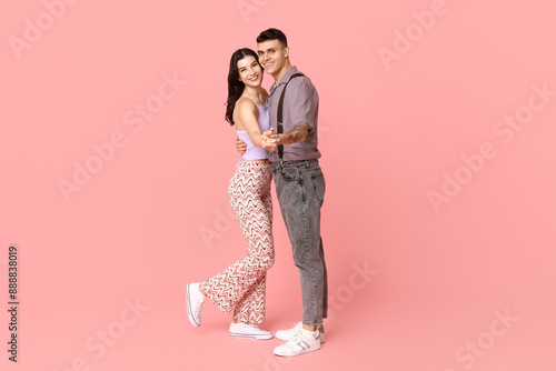 Beautiful young couple danc...
