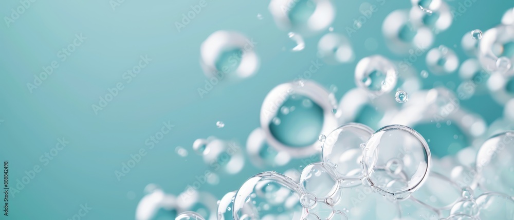 A collection of bubbles hovering above a blue-green backdrop with a gentle light blue sky behind A collection of bubbles hovering above a blue-green backdrop with a gentle light blue sky behind