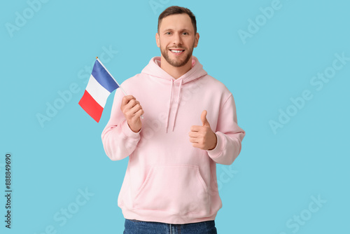 Young man with flag of Fran...