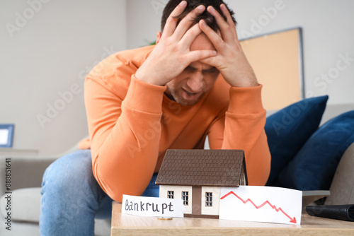 Paper with word BANKRUPT, d...