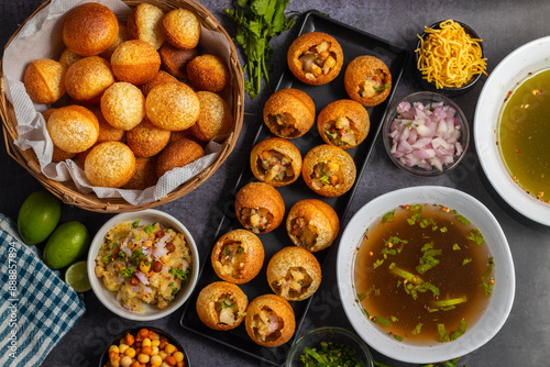 Exploring the Tangy, Spicy, and Refreshing Delight of Pani Puri. India's Favourite Street Food Experience. Selective focus. 