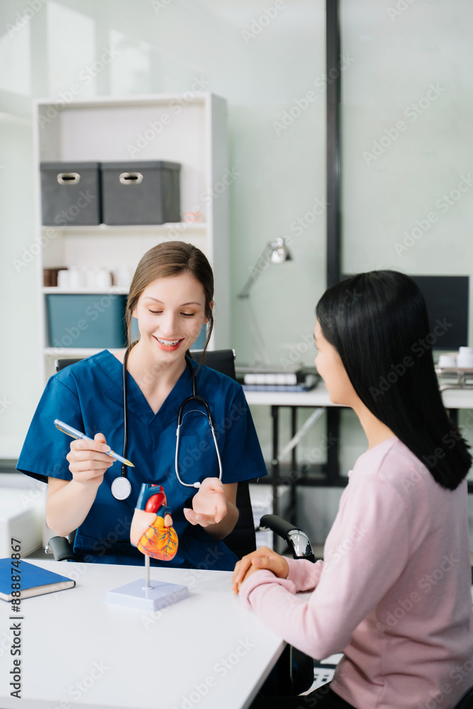 Portrait of female doctor explaining diagnosis to her patient. Doctor Meeting With Patient In Exam Room.