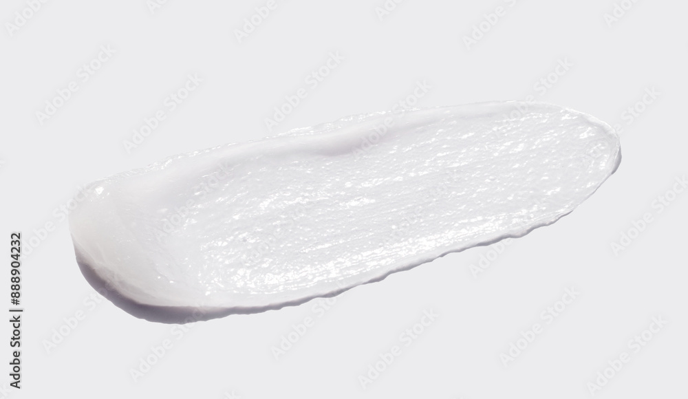 sample smear of cosmetic peeling gel on a light gray background close-up sample smear of cosmetic peeling gel on a light gray background close-up