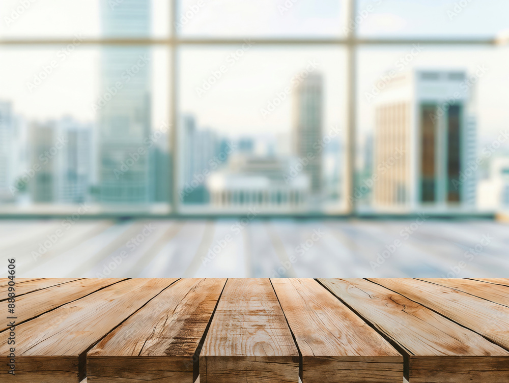 Empty wooden table top with blurred cityscape view from office window, can be used for display or montage your products Empty wooden table top with blurred cityscape view from office window, can be used for display or montage your products