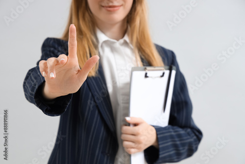 Businesswoman hand touching...