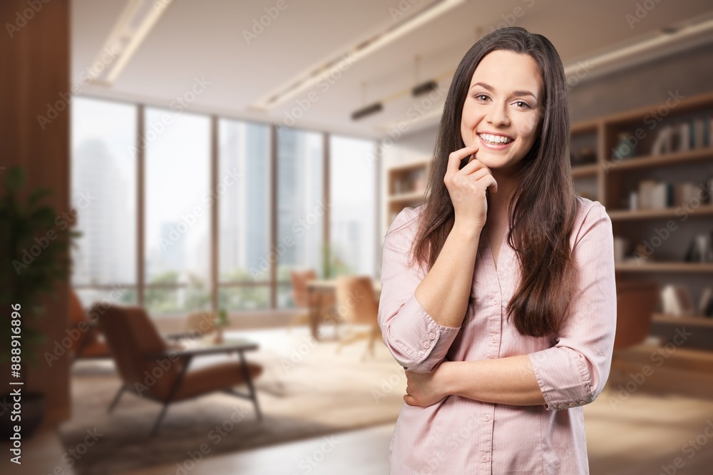 Fototapeta premium Happy woman posing in modern interior