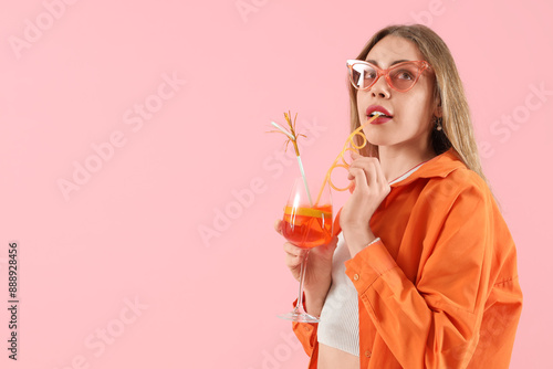 Young woman in sunglasses d...