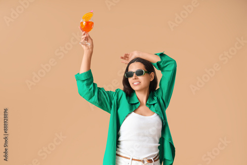 Young woman in sunglasses w...